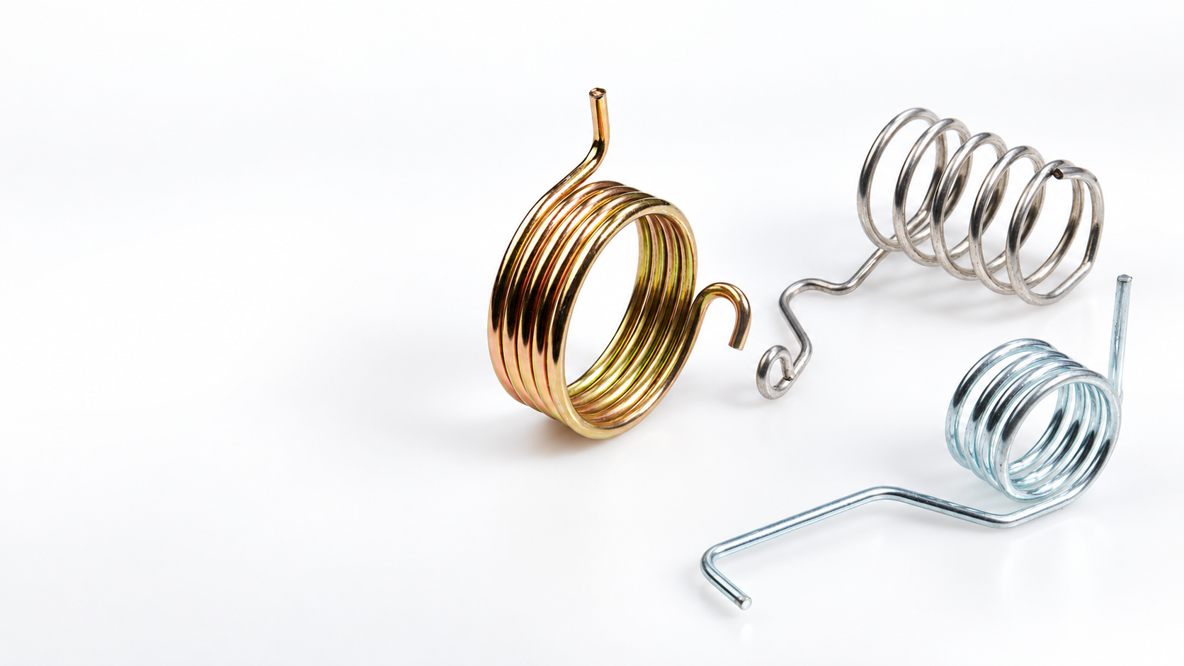 Torque Springs vs. Torsion Springs: Design Considerations for Precision Applications